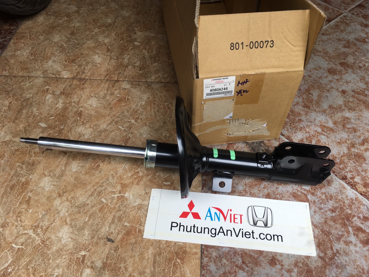 Giảm xóc trước xe mitsubishi Grandis 