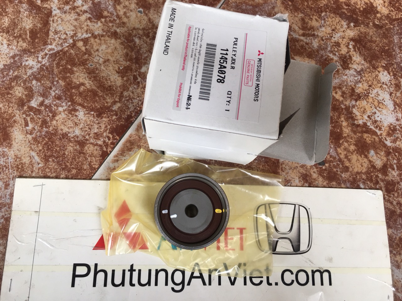 Bi tỳ cam xe mitsubishi Triton 