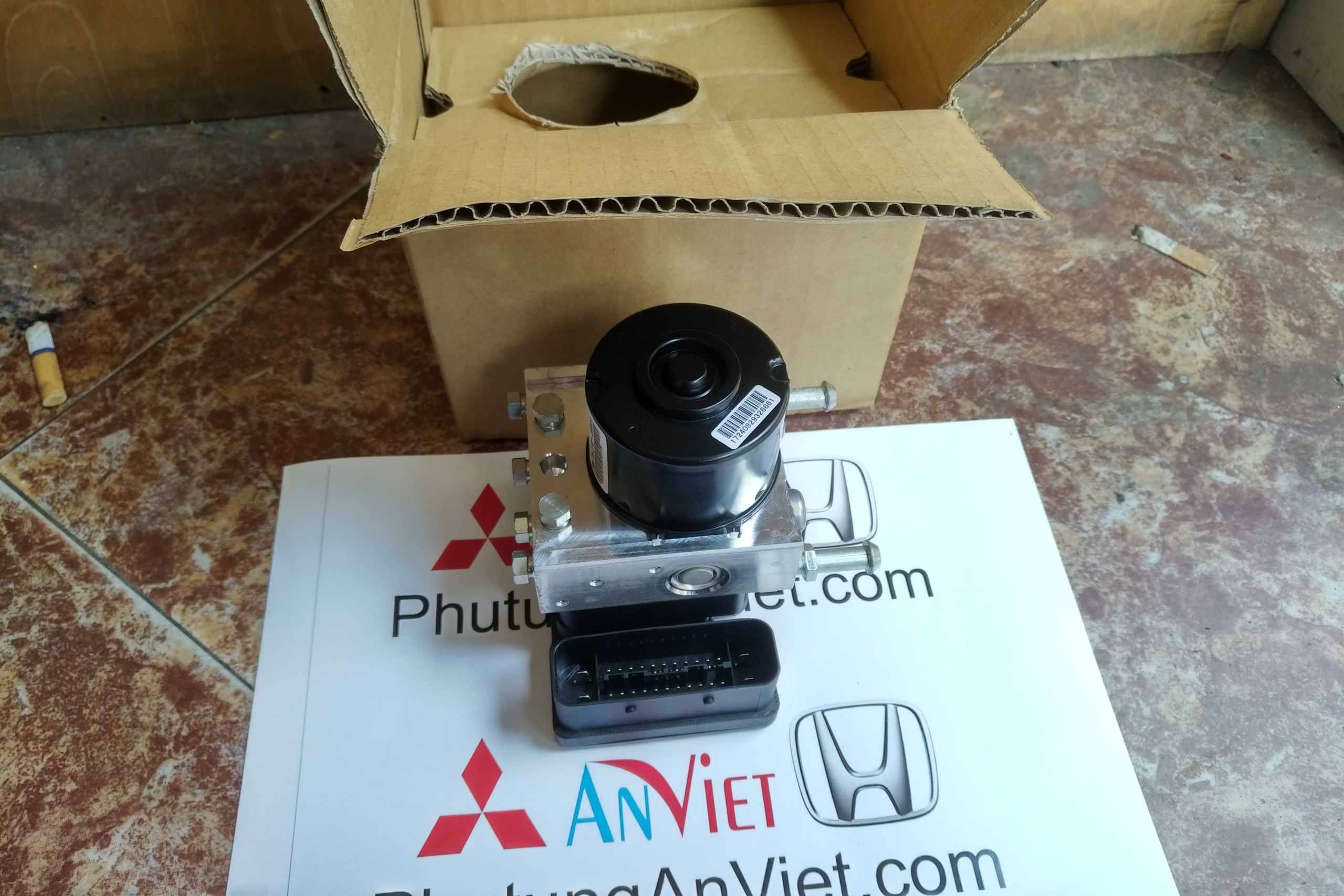 Cụm bơm ABS xe Mitsubishi Grandis 