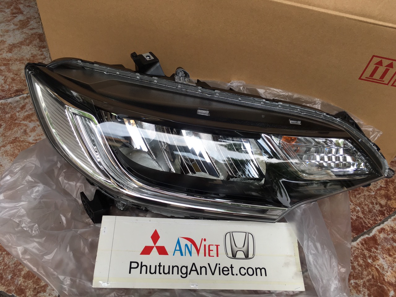 Đèn pha xe honda Jazz