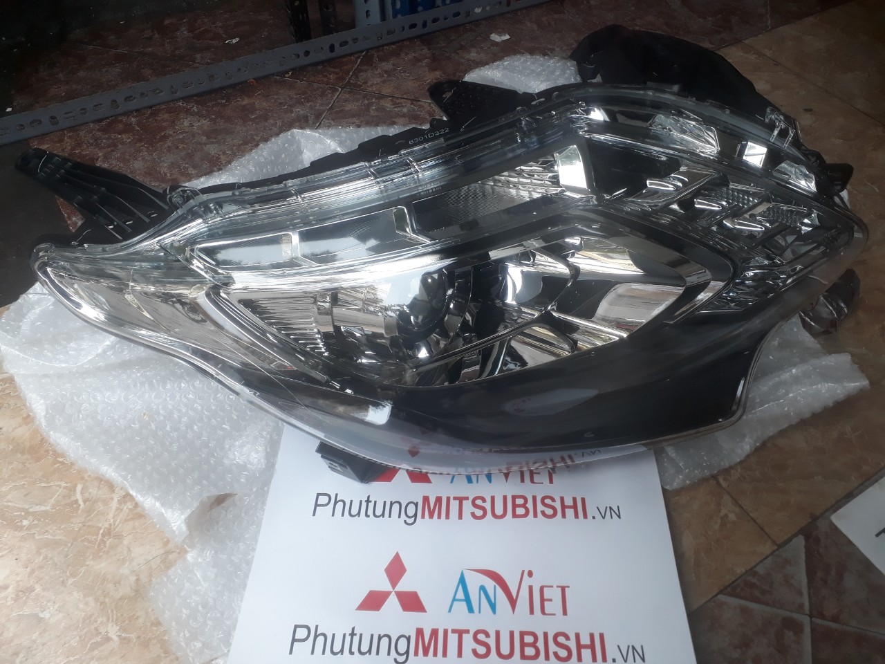 Đèn pha xe Mitsubishi Triton ALL New
