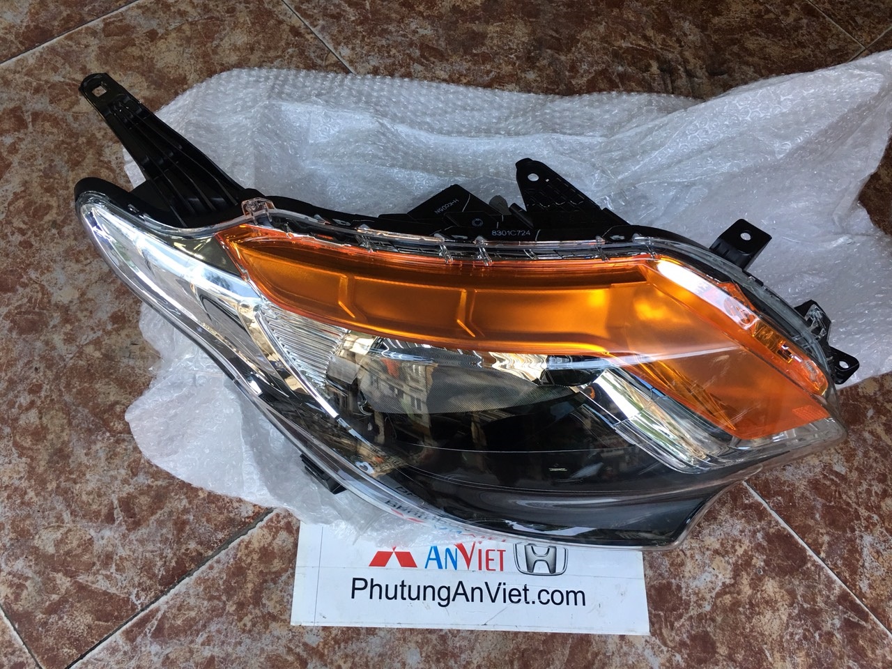 Đèn pha xe mitsubishi Triton