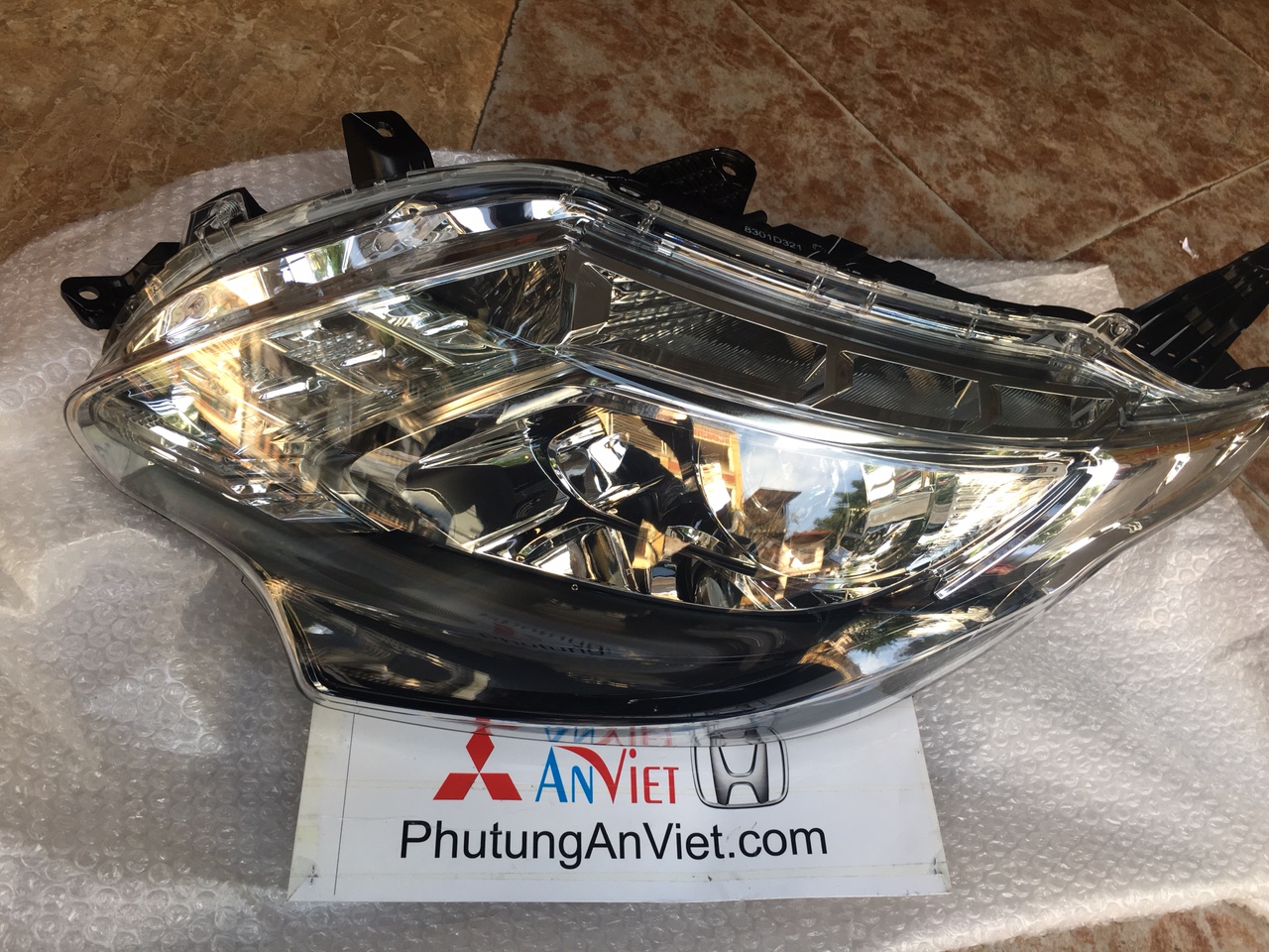 Đèn pha xe Mitsubishi triton all new 