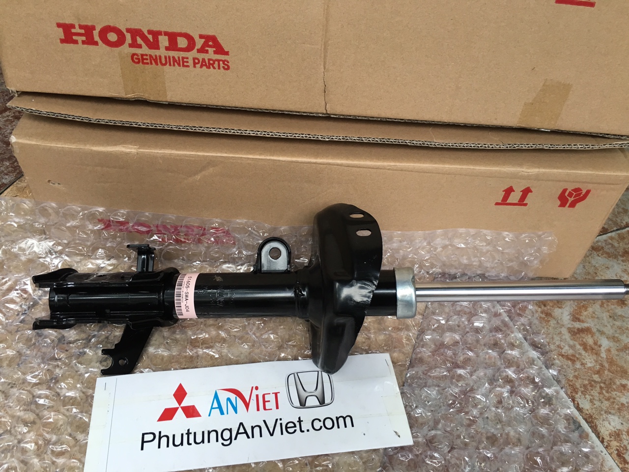 Giảm xóc trước xe honda CRV 