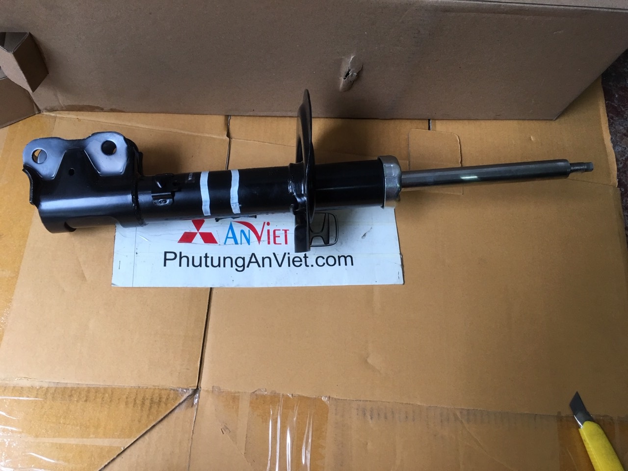 Giảm xóc trước xe mitsubishi Xpander