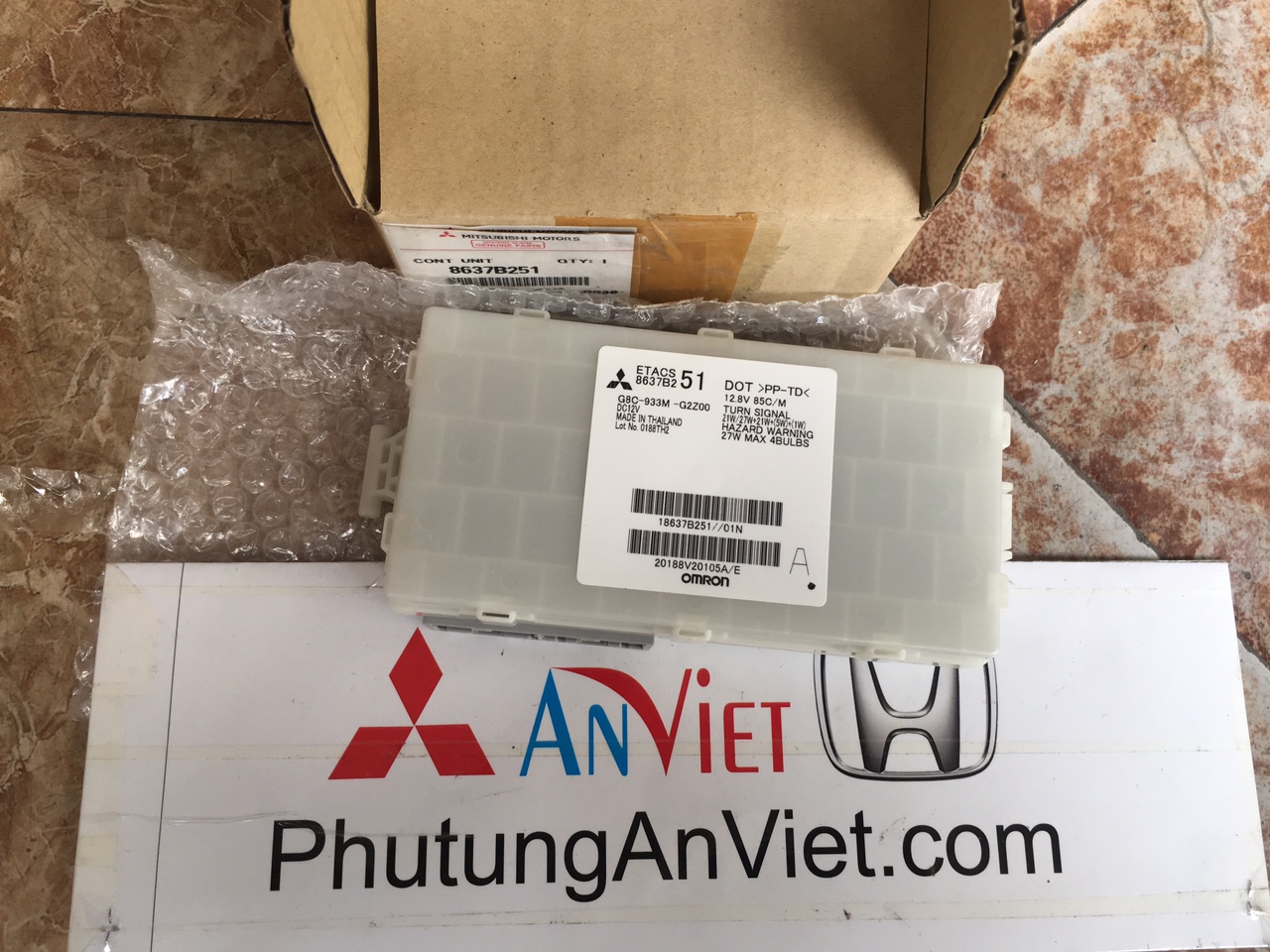Hộp etac điều khiển đèn pha xe Mitsubishi Triton