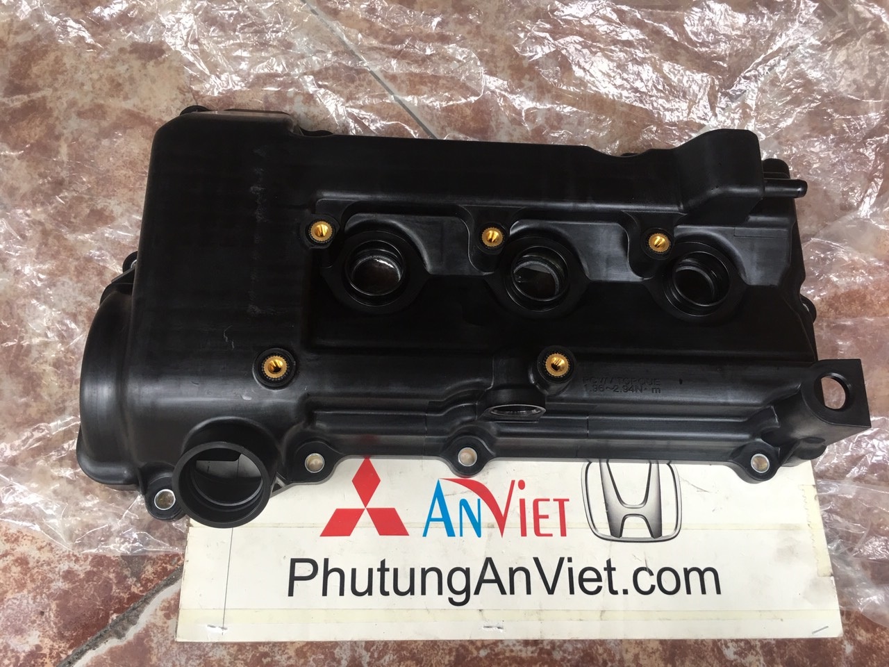 Nắp mặt quy lát xe mitsubishi Attrage
