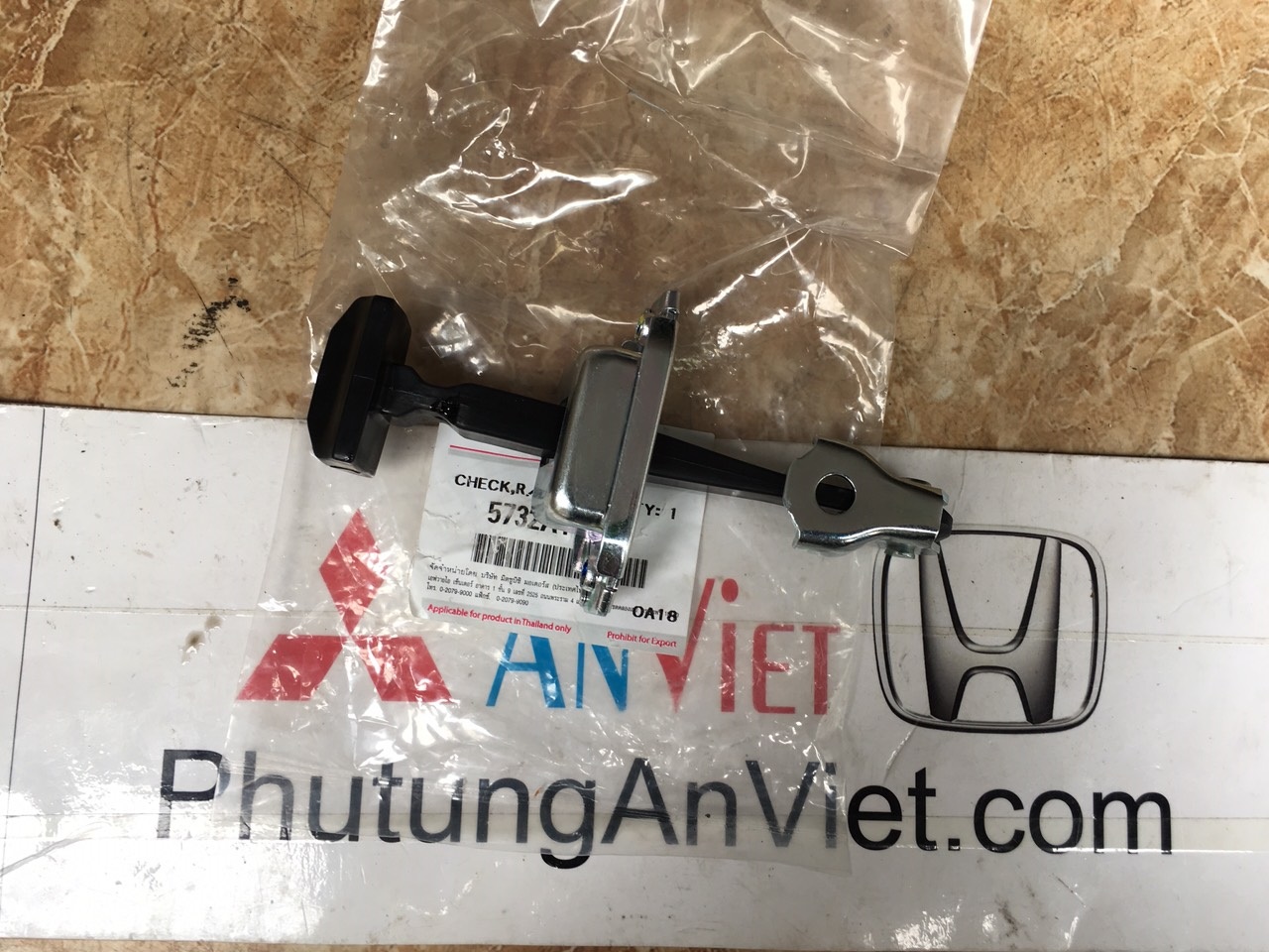 Thanh hạn chế cửa xe mitsubishi Triton